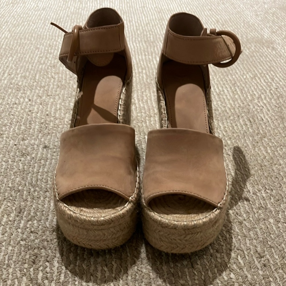 Platform Marc Fisher heels with side buckle and size 6 1/2.